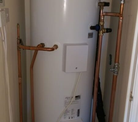 Unvented hot water cylinder all piped up and working.